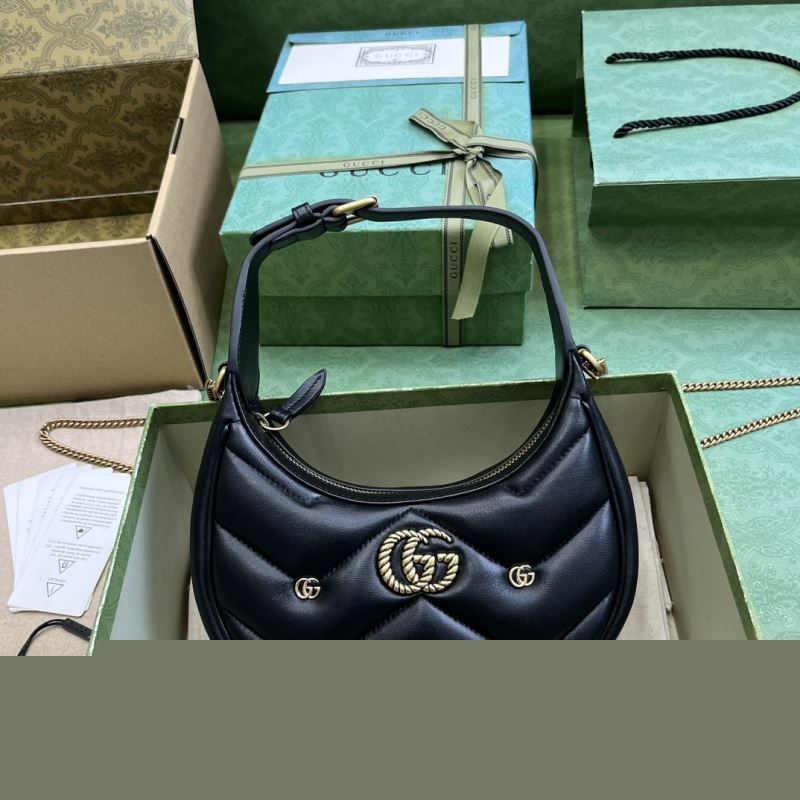 G*u*i top handle bags